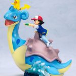 Figura de Ash Ketchum con Lapras y Pikachu de Pokémon